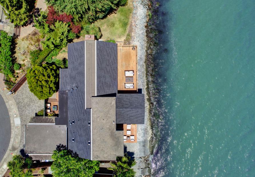 overhead view of home on the water. 